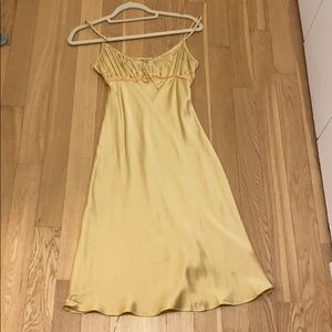 Yellow silk slip dress midi length
